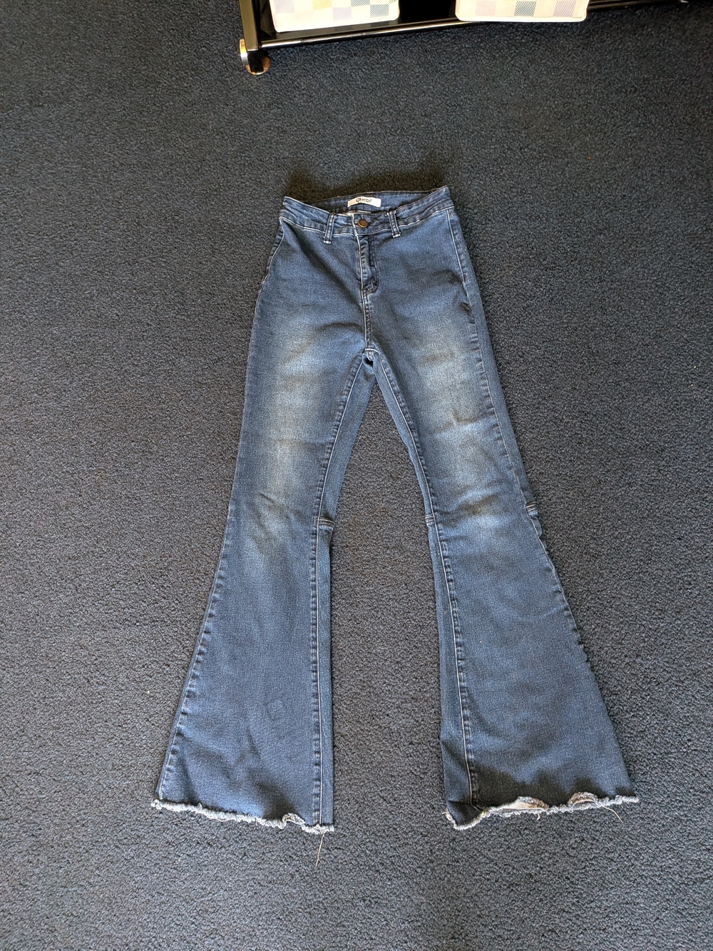 High-Rise Blue Flare Jeans with Raw Hem